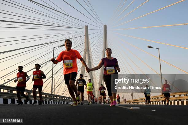 People take a part in a Half Marathon during the Tata Mumbai Marathon 2023 at Mahim, on January 15, 2023 in Mumbai, India.