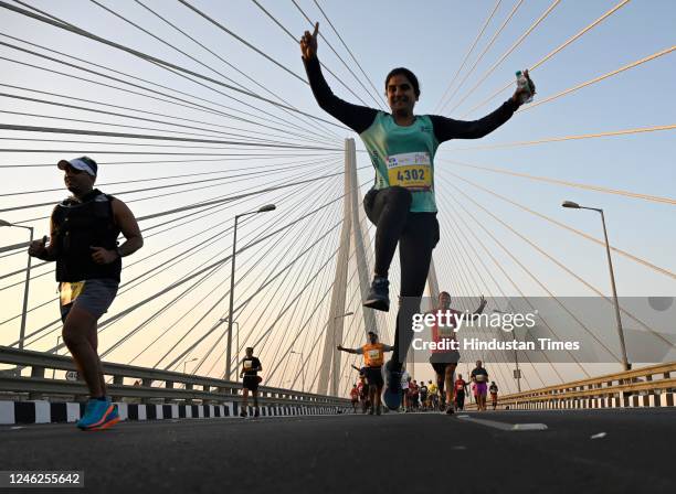 People take a part in a Half Marathon during the Tata Mumbai Marathon 2023 at Mahim, on January 15, 2023 in Mumbai, India.