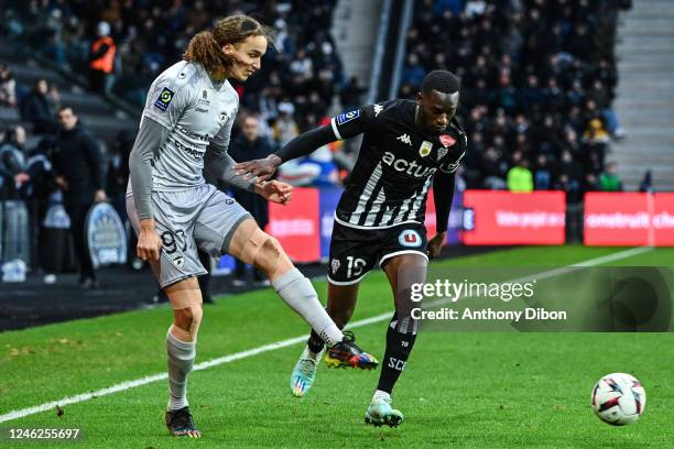 Yanis MASSOLIN of Clermont and Abdallah SIMA of Angers Sco during the Ligue 1 Uber Eats match between Angers and Clermont at Stade Raymond Kopa on...