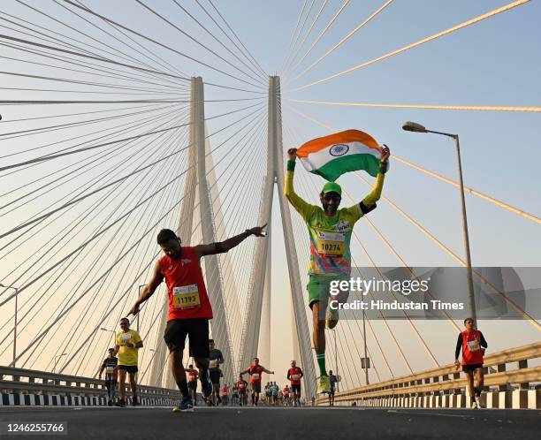 People take a part in a Half Marathon during the Tata Mumbai Marathon 2023 at Mahim, on January 15, 2023 in Mumbai, India.