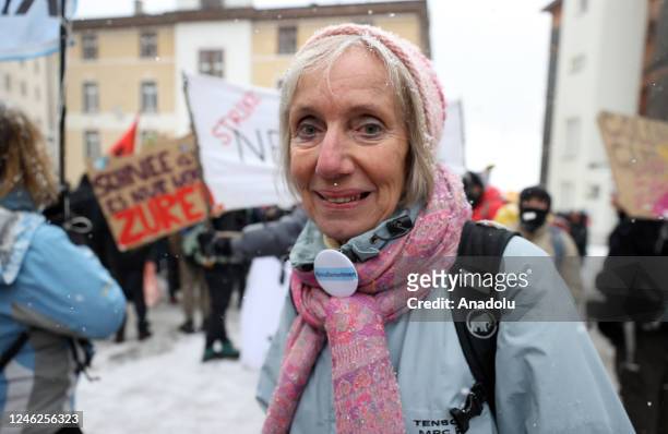 Activists take part in a protest to raise awareness on climate change and environment prior to the WEF annual meeting to be held from January 16 to...