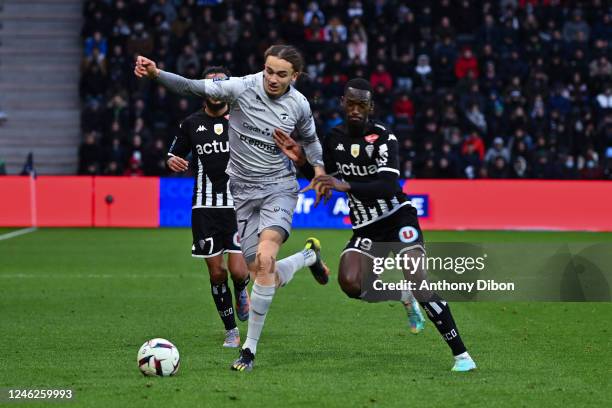 Yanis MASSOLIN of Clermont and Abdallah SIMA of Angers Sco during the Ligue 1 Uber Eats match between Angers and Clermont at Stade Raymond Kopa on...