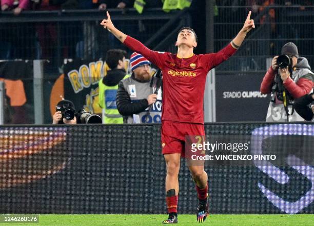 Romas Argentinian forward Paulo Dybala celebrates after scoring a goal during the Italian Serie A football match between AS Roma and Fiorentina on...