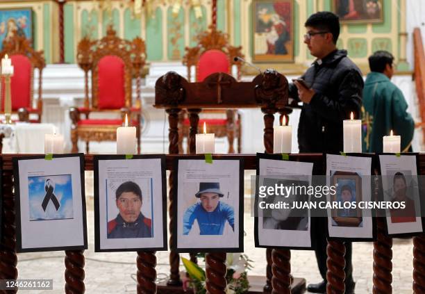 Pictures of victims are displayed at the altar of the San Juan Catholic church in memory of those killed in the five week-long protests against...