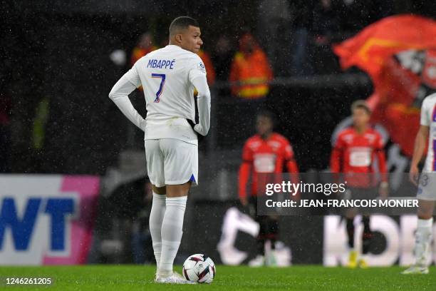 Paris Saint-Germain's French forward Kylian Mbappe reacts during the French L1 football match between Stade Rennais FC and Paris Saint-Germain at the...