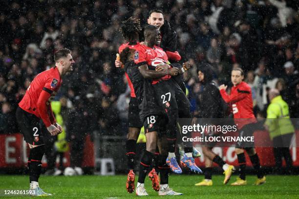 Rennes' Malian defender Hamari Traore and Rennes' French defender Jeanuel Belocian celebrate after winning the French L1 football match between Stade...