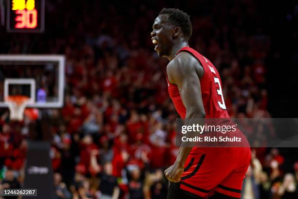 Mawot Mag of the Rutgers Scarlet Knights reacts after scoring a basket against the Ohio State Buckeyes during overtime in a game at Jersey Mike's...