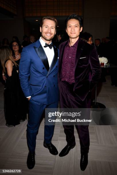 Glen Powell and Harry Shum Jr. At the 28th Critics' Choice Awards held at the Fairmont Century Plaza on January 15, 2023 in Los Angeles, California.