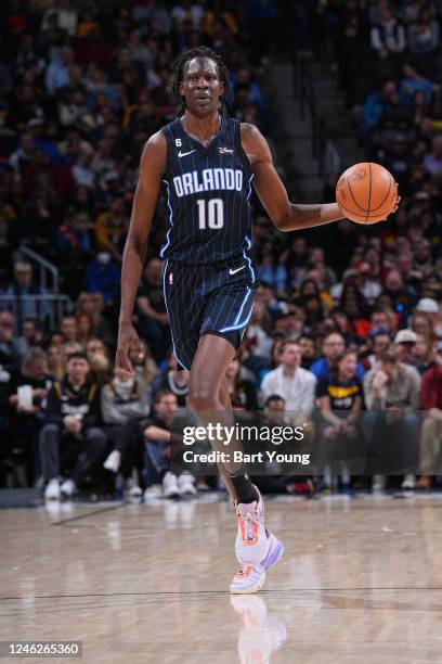 Bol Bol of the Orlando Magic moves the ball during the game against the Denver Nuggets on January 15, 2023 at the Ball Arena in Denver, Colorado....