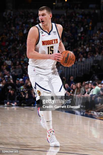 Nikola Jokic of the Denver Nuggets dribbles the ball during the game against the Orlando Magic on January 15, 2023 at the Ball Arena in Denver,...