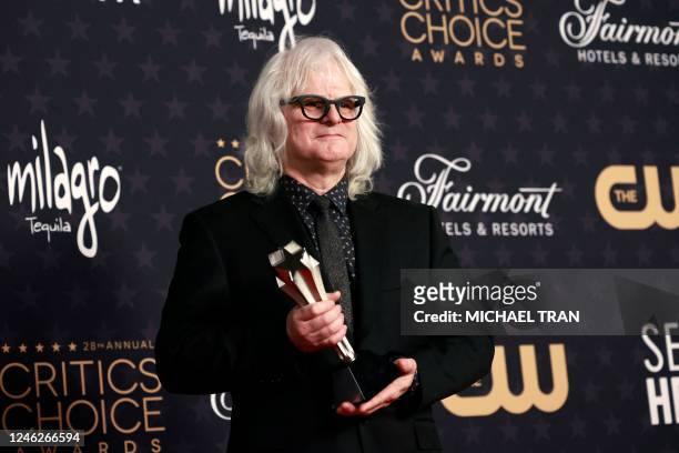 Chilean cinematographer Claudio Miranda poses in the press room with the award for Best Cinematography for "Top Gun: Maverick" during the 28th Annual...