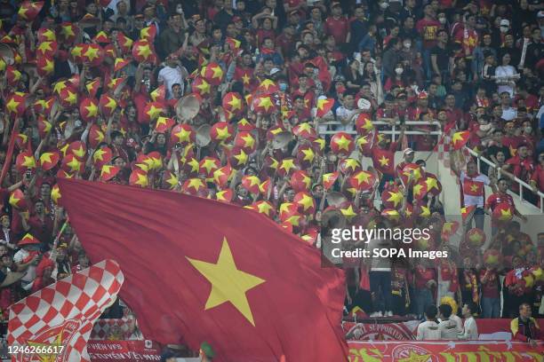 Vietnam fans seen cheering during the AFF Mitsubishi Electric Cup 2022 match between Vietnam and Thailand at My Dinh National Stadium. Final score;...