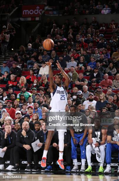 Reggie Bullock of the Dallas Mavericks shoots a three point basket during the game against the Portland Trail Blazers on January 15, 2023 at the Moda...