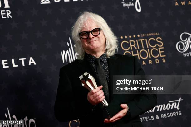 Chilean cinematographer Claudio Miranda poses in the press room with the award for Best Cinematography for "Top Gun: Maverick" during the 28th Annual...