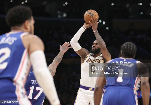 Los Angeles, CA Lakers forward LeBron James surpases his career record of 38,000 points with a jump shot over 76ers forward P.J. Tuckerin the first...
