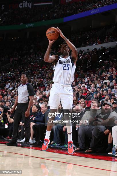 Reggie Bullock of the Dallas Mavericks shoots a three point basket during the game against the Portland Trail Blazers on January 15, 2023 at the Moda...