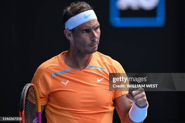 Spain's Rafael Nadal reacts after a point against Britain's Jack Draper during their men's singles match on day one of the Australian Open tennis...