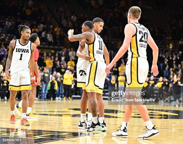 Iowa players celebrate on the court after winning a college basketball game between the Maryland Terrapins and the Iowa Hawkeyes on January 15 at...