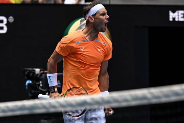 Spain's Rafael Nadal reacts after a point against Britain's Jack Draper during their men's singles match on day one of the Australian Open tennis...