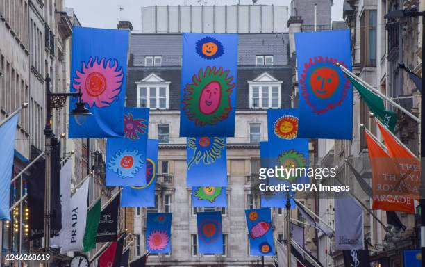 Banners with artwork by Yayoi Kusama decorate Bond Street as fashion giant Louis Vuitton launches its collaboration with the renowned Japanese artist.