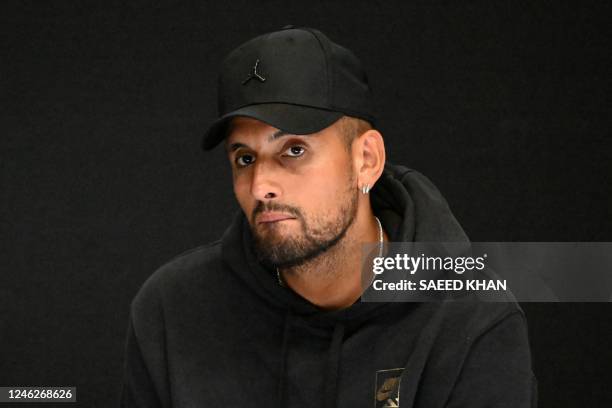 Australia's Nick Kyrgios speaks during a press conference on day one of the Australian Open tennis tournament in Melbourne on January 16, 2023. -...