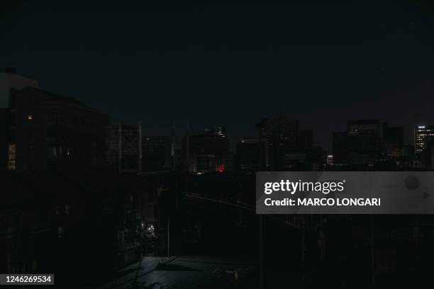 This general view shows the Braamfontein district of Johannesburg, on January 15, 2023 as seen from the Bree Taxi Rank in the CBD district plunged in...