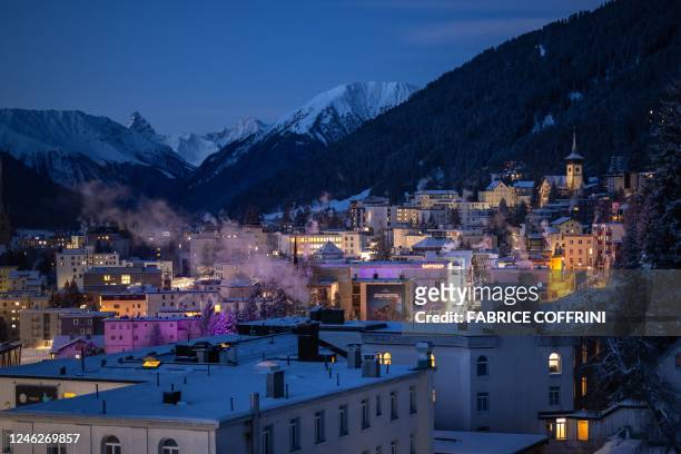 Photograph shows a general view of the alpine resort of Davos, on the opening day of the annual World Economic Forum in Davos on January 16, 2023. -...