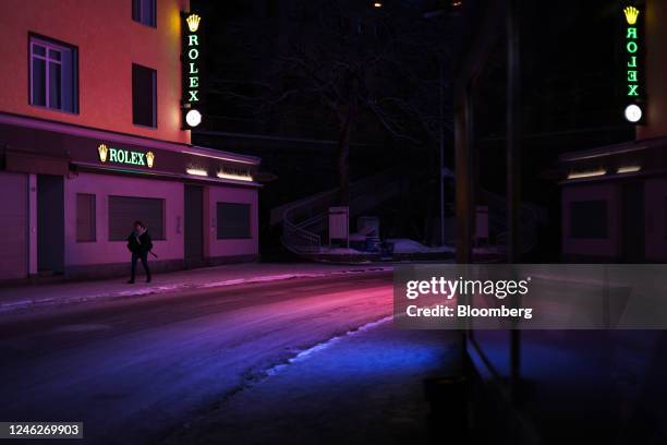 Pedestrian passes a closed Rolex SA luxury watch store on the Promenade ahead of the World Economic Forum in Davos, Switzerland, on Monday, Jan. 16,...