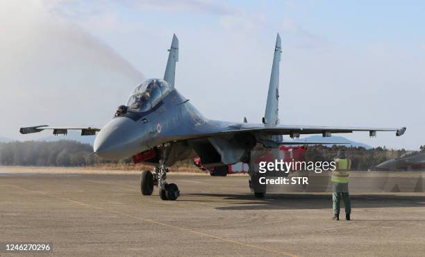 This picture taken on January 10, 2023 shows an Indian Air Force fighter aircraft Sukhoi Su-30 arriving at the Japan's Air Self-Defense Force Hyakuri...