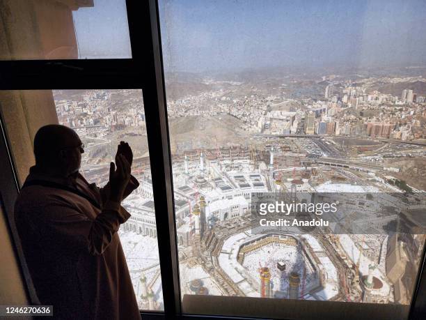 An aerial view the Kaaba, Islam's holiest site located in the center of the Masjid al-Haram as a man prays in Mecca, Saudi Arabia on January 8, 2023....