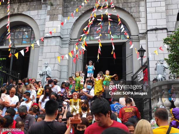 Huge volume of crowd is leaving the Santo Niño de Tondo Parish during the feast of Señor Santo Niño in Tondo, Manila. Catholic devotees flock to...