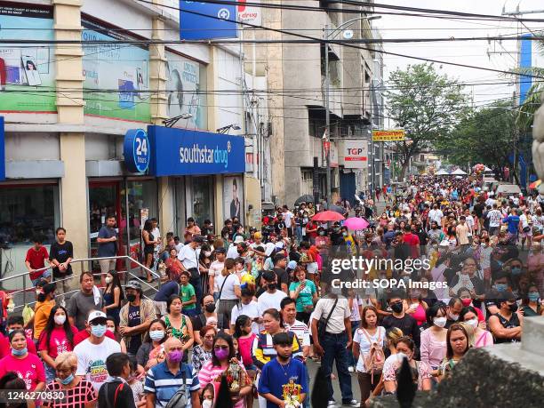 Thousands of Catholic faithful flock to Santo Niño de Tondo Parish in Manila to attend a Mass celebrating the Feast of the Santo Niño. Catholic...