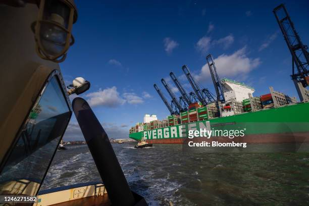 Container ship Ever Act, operated by Evergreen Marine Corp., on the dockside at the Port of Felixstowe, owned by a unit of CK Hutchison Holdings...