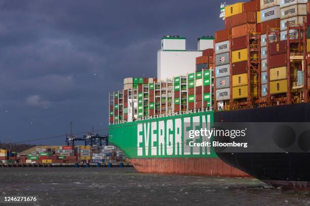 Container ship Ever Act, operated by Evergreen Marine Corp., on the dockside at the Port of Felixstowe, owned by a unit of CK Hutchison Holdings...