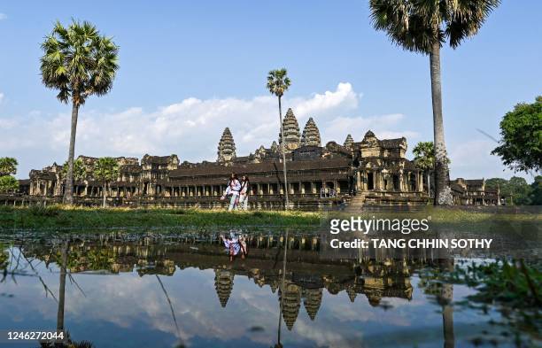 Tourists visit the Angkor Wat temple complex, a UNESCO World Heritage Site, in Siem Reap province on January 16, 2023.