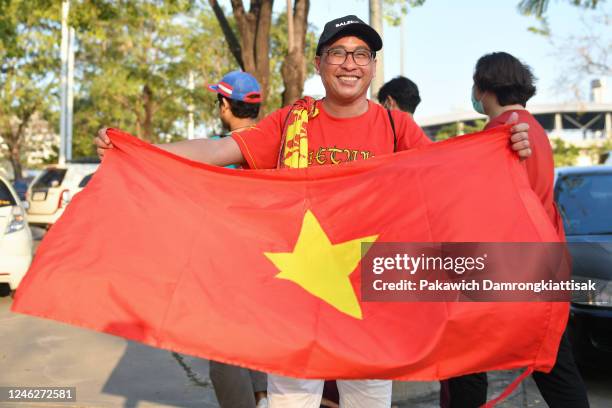 Vietnam fan poses for photos prior to the AFF Mitsubishi Electric Cup final second leg match between Thailand and Vietnam at Thammasat Stadium on...