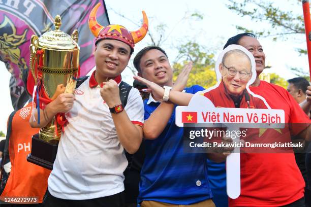 Fans pose for photos prior to the AFF Mitsubishi Electric Cup final second leg match between Thailand and Vietnam at Thammasat Stadium on January 16,...