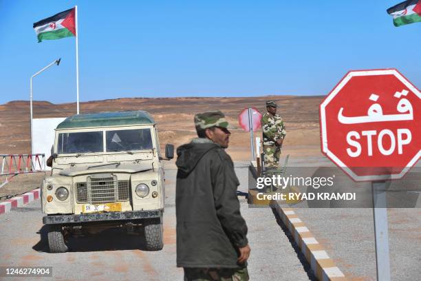 Flag of the Western Sahara, known as the Sahrawi Arab Democratic Republic, flutters at a checkpoint manned by members of the Sahrawi security forces...