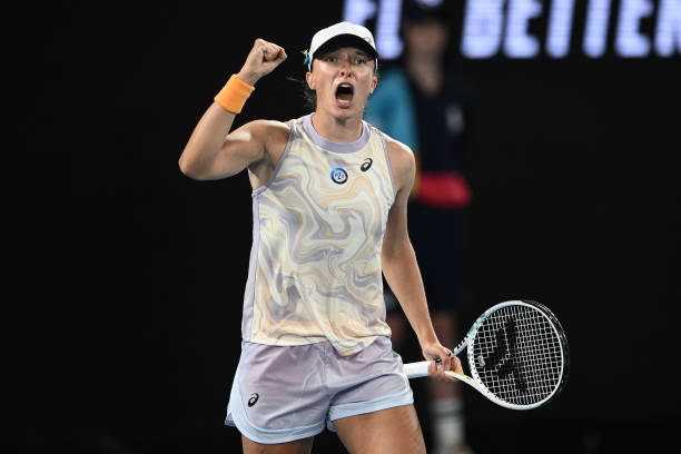 Iga Swiatek celebrates winning her first round match at the Australian Open grand slam tennis tournament at Melbourne Park in Melbourne, Australia on...