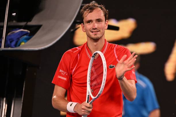 Russia's Daniil Medvedev celebrates after winning against Marcos Giron of the US at the end of their men's singles match on day one of the Australian...