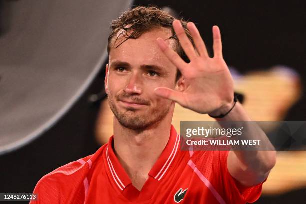 Russia's Daniil Medvedev celebrates after winning against Marcos Giron of the US at the end of their men's singles match on day one of the Australian...