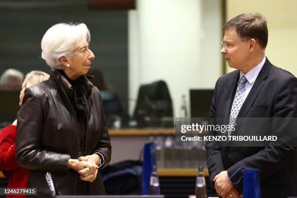 European Central Bank President Christine Lagarde speaks with European Commission vice-president in charge the Euro, Social Dialogue, Financial...