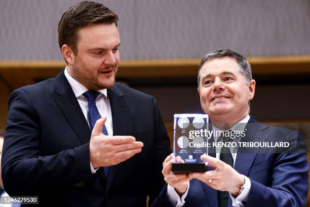 Croatia's Economy Minister Tomislav Coric poses with President of the Eurogroup Paschal Donohoe prior to a Eurogroup meeting at the EU headquarters...