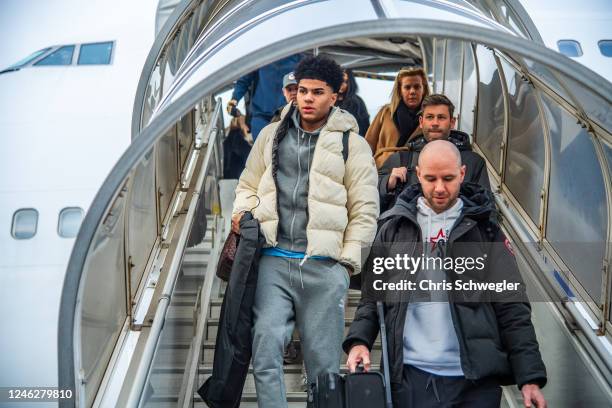 Killian Hayes of the Detroit Pistons gets off the plane as they arrive in Paris as part of the 2023 NBA Paris Games on January 16, 2023 in Paris,...