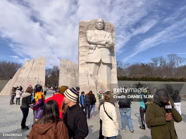 People visit the Martin Luther King, Jr. Memorial, January 16, 2023 in Washington, DC. - Americans marked the birth and legacy of civil rights leader...