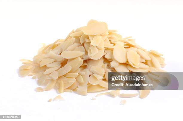 flaked almonds - almonds on white stock pictures, royalty-free photos & images