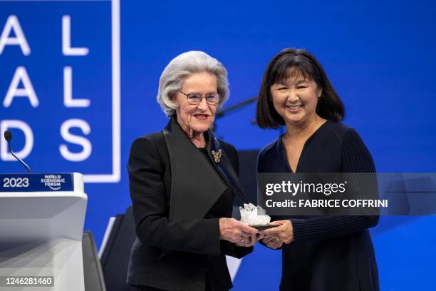 Designer and sculptor Maya Lin poses with World Economic Forum's World Arts Forum chairwoman Hilde Schwab during the "Crystal Award" ceremony at the...