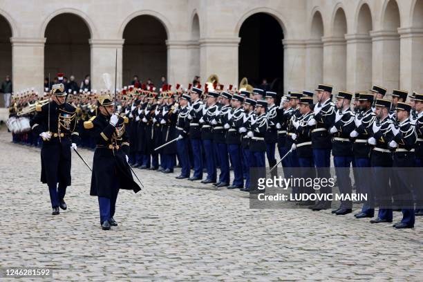 French soldiers of the Gendarmerie Nationale attend a ceremony of addressing New Year wishes to French Gendarmerie at the Hotel des Invalides in...