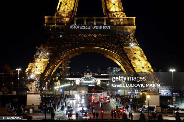 Photo shows the wods "Stop executions in Iran" displayed on the Eiffel Tower in Paris in support of the Iranian people, in the wake of the death of...