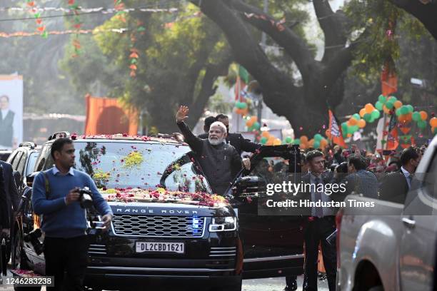 Prime Minister Narendra Modi during a roadshow ahead of the BJP national executive meet on January 16, 2023 in New Delhi, India.